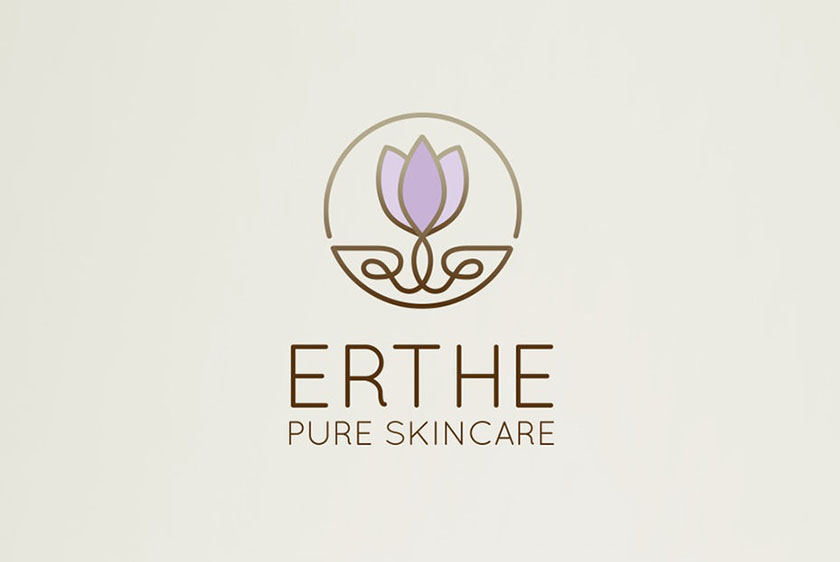 圓形徽標顯示雙色紫色郁金香標志設計