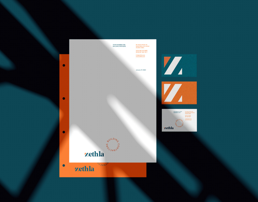 Zethla 建筑公司logo設(shè)計vi設(shè)計，正方形被斜切出字母Z+藍(lán)橙工業(yè)配色