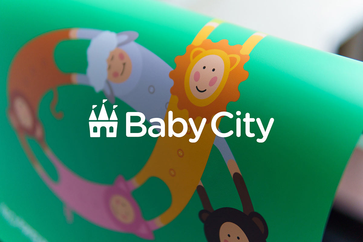 Baby City 嬰兒城嬰兒用品品牌vi設(shè)計，首尾相連的卡通人物視覺